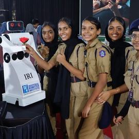 Students with the IRI robot