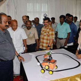 Educators at a student robotics demo