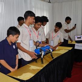 Students with a robot dog