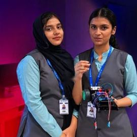 College students with their robot